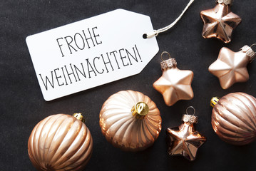Obraz na płótnie Canvas Bronze Tree Balls, Frohe Weihnachten Means Merry Christmas