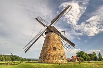 Fototapeta na wymiar Wooden windmilll