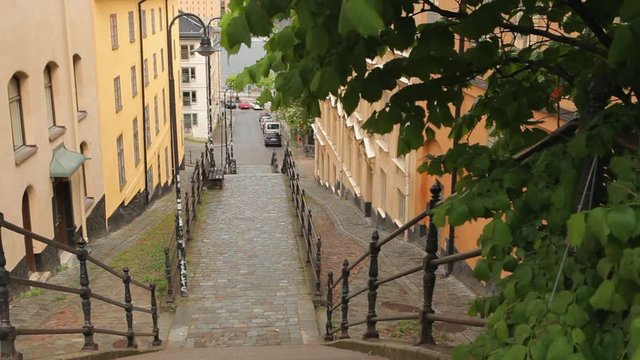Stairs in a pedestrian street in Gamla Stan, Stockholm, Sweden. Cobblestone and old buildings.