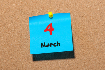 March 4th. Day 4 of month, calendar on cork notice board background. Spring time, empty space for...