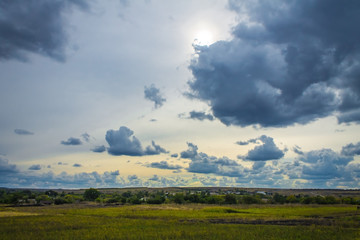 Obraz premium plowed field in gloomy day, nature background