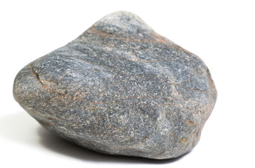 Single natural stone on white background