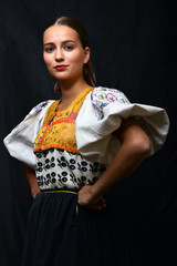Woman of Slovak folk dance with colorful clothes