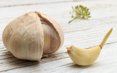 Garlic on a white wooden board
