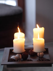 Four candles burning