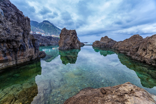 Natural volcanic pools with sea water in Porto Moniz, Madeira, Portugal.