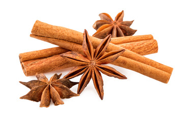 Anise and cinnamon sticks on white. Winter spices closeup.