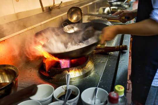 blurred chef of a restaurant kitchen