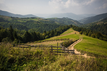 Road pass view to villages and mountains