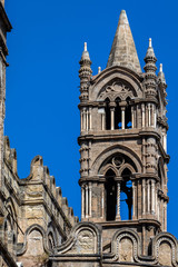 Fototapeta na wymiar Tower of the Palermo Cathedral in Palermo, Sicily. The cathedral is characterized by the presence of different styles, due to a long history of additions, alterations and restorations.