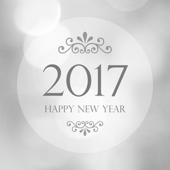 Happy New Year 2017 year on abstract blur  bokeh background