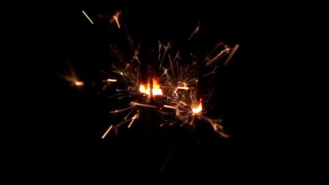 Fireworks sparkler on black background. Slow motion
