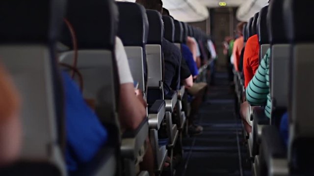 Plane Passengers Waiting for Flight Takeoff