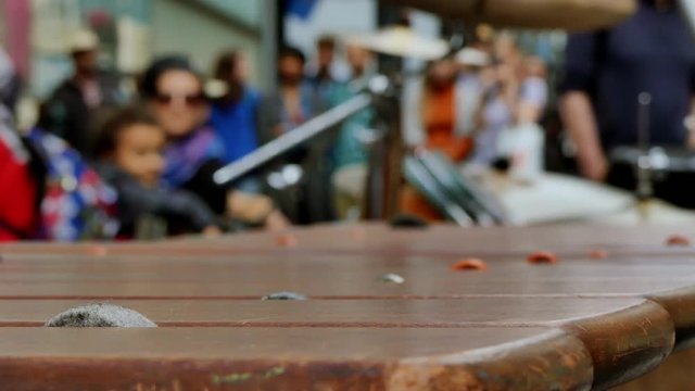 Street performance xylophonist closeup day