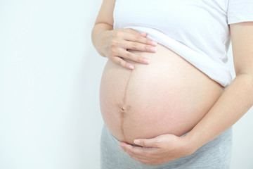 Close up of a cute pregnant belly