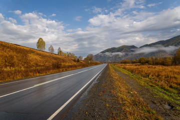 road mountains sky asphalt autumn