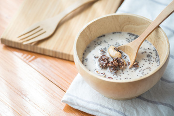 Morning granola breakfast with raisins and hazelnut