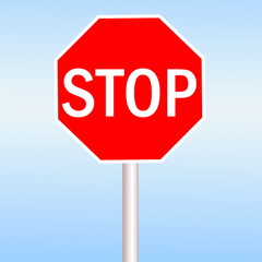 Red Stop sign in blue sky background