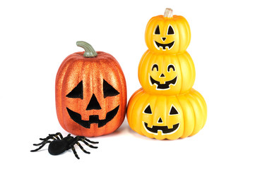 Halloween pumpkin lantern and spider isolated on white background