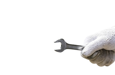 Metal wrench in male hand  isolated on the white background. Thi