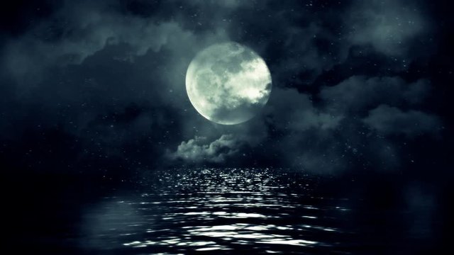 Full Moon Above Water on a Cloudy Night with Stars