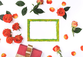 Red roses with gift and blank card