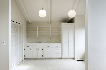 Classic Spacious White Storage Room with Sink