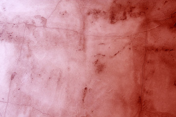 Red concrete wall background with texture