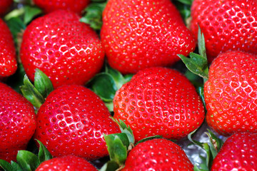 background from freshly harvested strawberries.