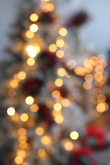 Obraz premium Defocused abstract multicolored bokeh lights background.