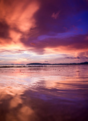 Fototapeta na wymiar Tropical sunset on the beach. Ao-Nang. Krabi