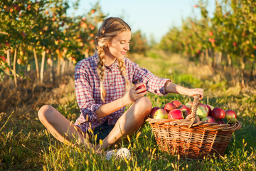 Beautiful young woman  in orchard