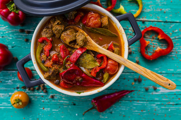 Delicious goulash with beef and red pepper stewed with vegetables and herbs. 