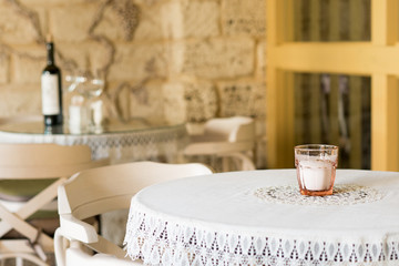 Covered table with a tablecloth in a restaurant.