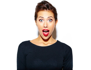beautiful happy surprised sexy brunette woman in casual black dress with red lips on white...