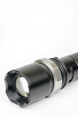 Black police torchlight over white background