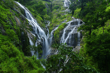 Fototapeta na wymiar Deep forest waterfall in Thailand