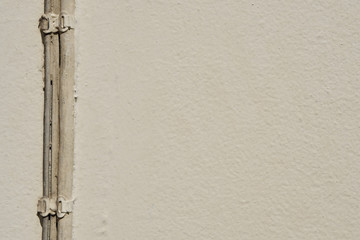 wall background with electricity cable border, energy concept