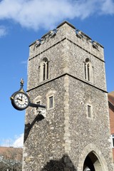 Fototapeta na wymiar Norman Tower with antique clock on side