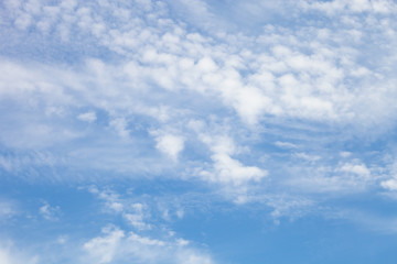 White clouds on a blue sky. Selective focus
