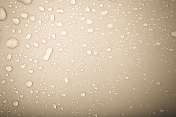 Drops of water on a color background. Gray. Toned