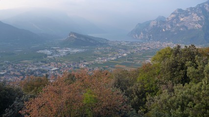 misty view at lago di garda mountains