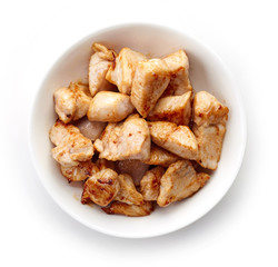 Bowl of grilled chicken meat from above