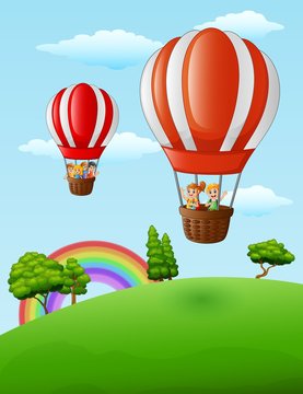 Two air balloons flying with happy kids