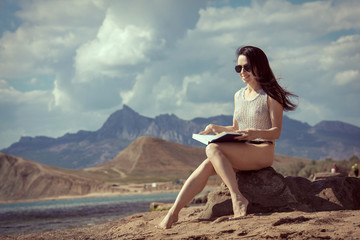 Fototapeta na wymiar Happy woman enjoying beach relaxing joyful in summer by tropical