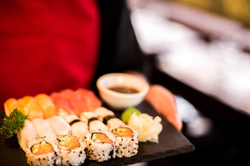 Sushi set at rustic wood.