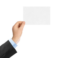 Fototapeta premium Blank paper card in hand