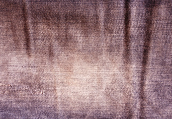 Brown worn jeans texture.