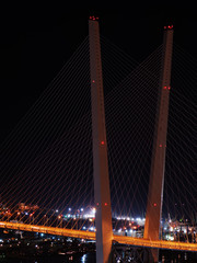 night view of the bridge in the Russian Vladivostok over the Golden Horn bay