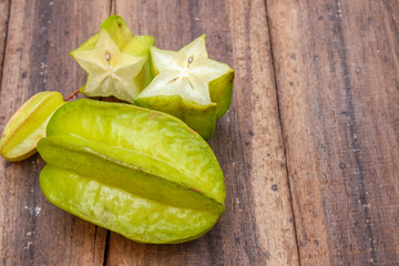 Star fruit on wood background ,starfruit on wooden background  